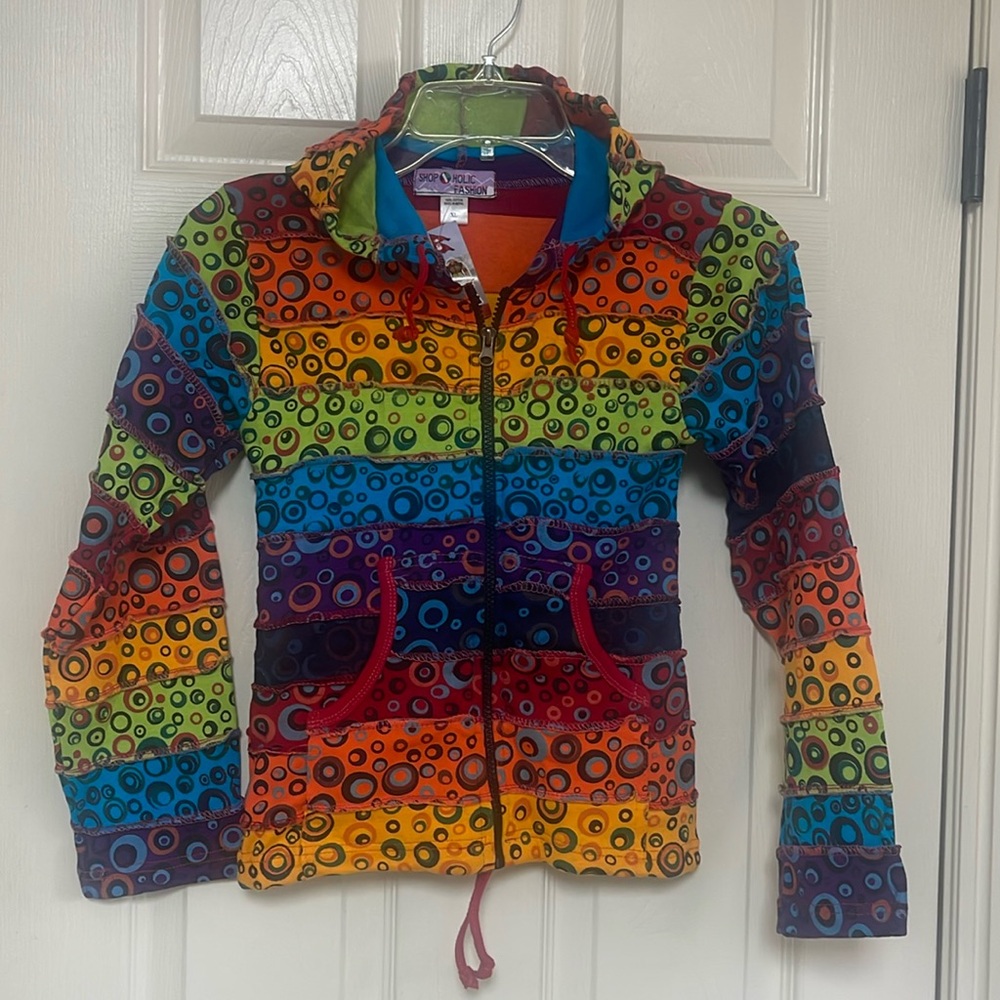 Shop Holic Fashion very colorful jacket with hood. Tag says XL. Fits like a med